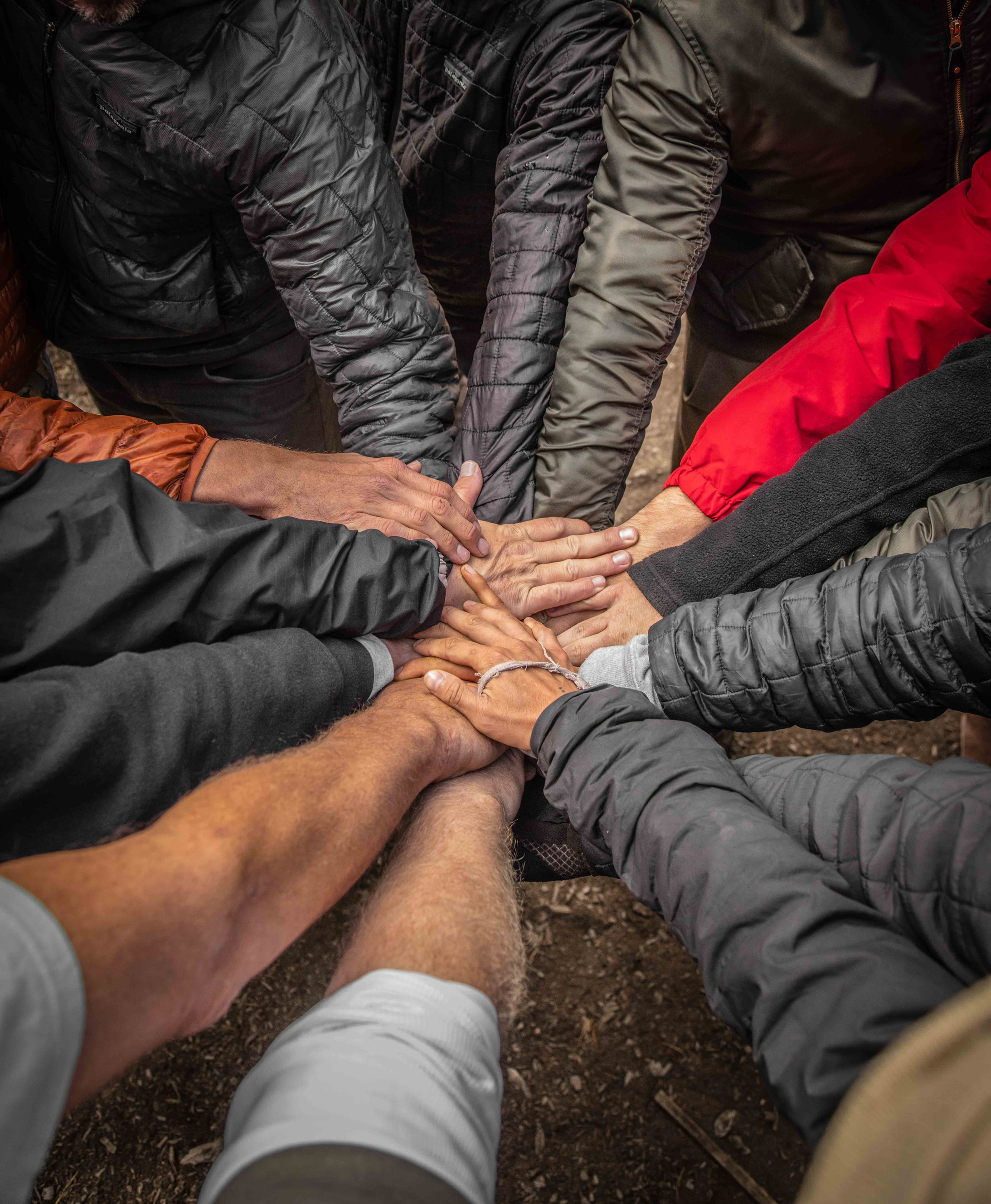 Hands together — the founding circle